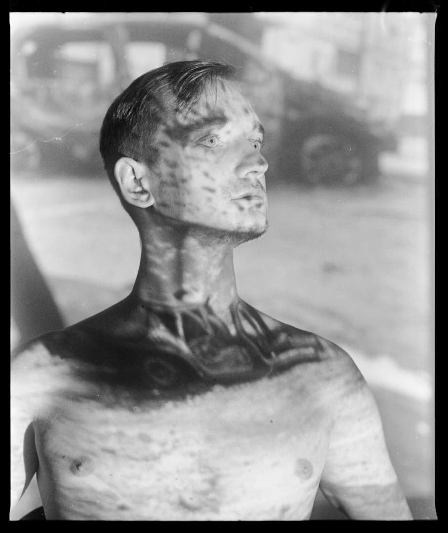 SERGEY MELNITCHENKO: TATOOS OF WAR (SIGNED WITH PRINT)
